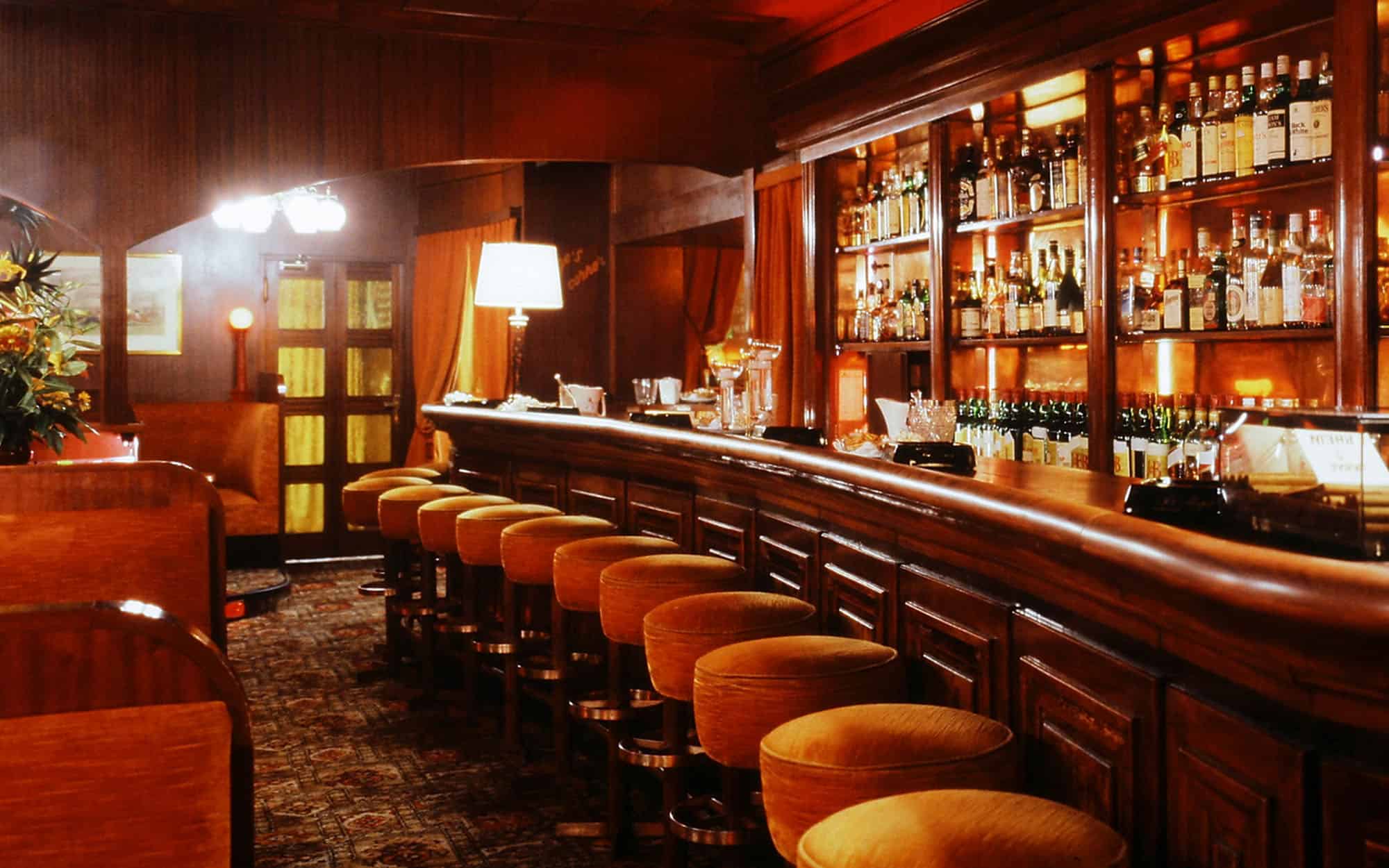 Side view of bar counter with fancy stools